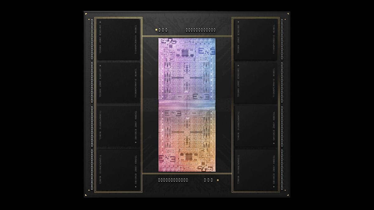 A glowing rainbow M1 Ultra chip, surrounded by baked-in memory modules