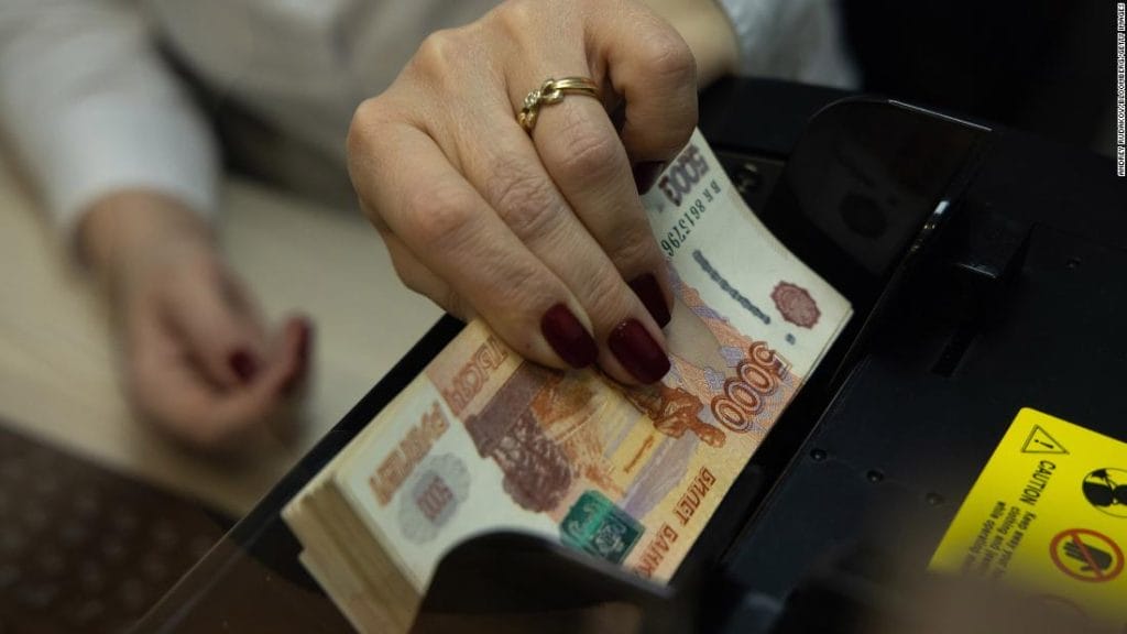 Russian stocks collapse and the ruble falls to a record low